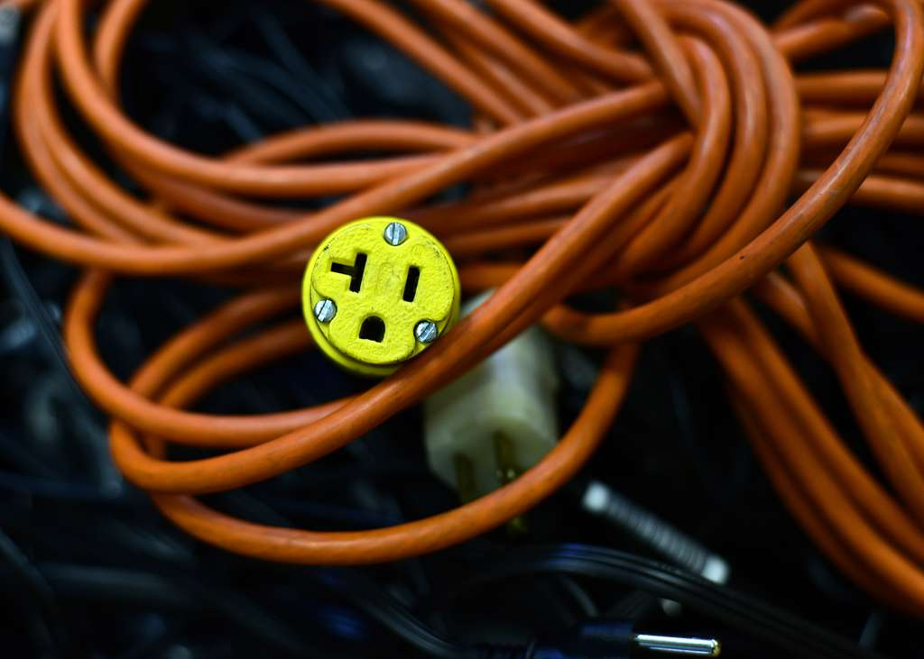 Electrical cord with face